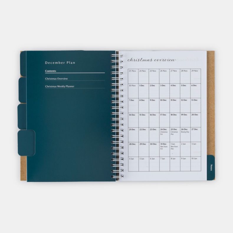 National Trust Christmas Planner opened to the December Plan section, featuring tabbed dividers and planning pages for organising festive activities. The right-hand page includes a Christmas overview calendar running from late November to early January, w