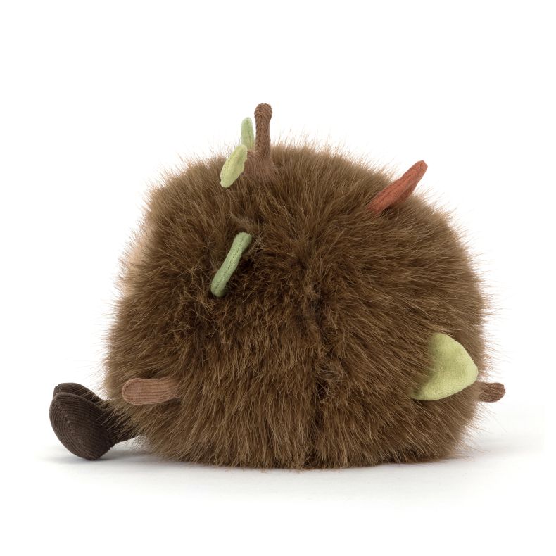 Jellycat soft toy featuring a round, fluffy brown character with a smiling face, corduroy feet and soft fabric leaves and branches. The woodland-inspired plush has textured faux fur and charming nature-themed details.