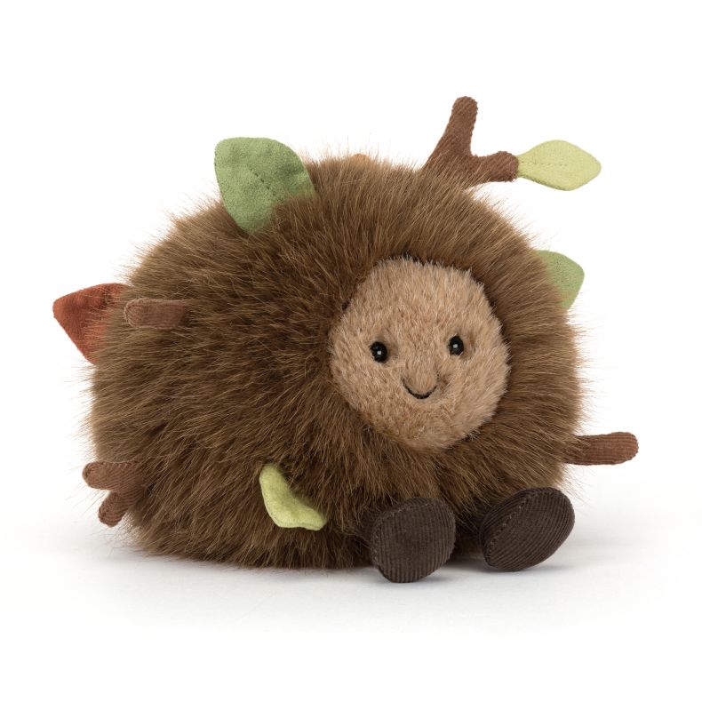 Jellycat soft toy featuring a round, fluffy brown character with a smiling face, corduroy feet and soft fabric leaves and branches. The woodland-inspired plush has textured faux fur and charming nature-themed details.