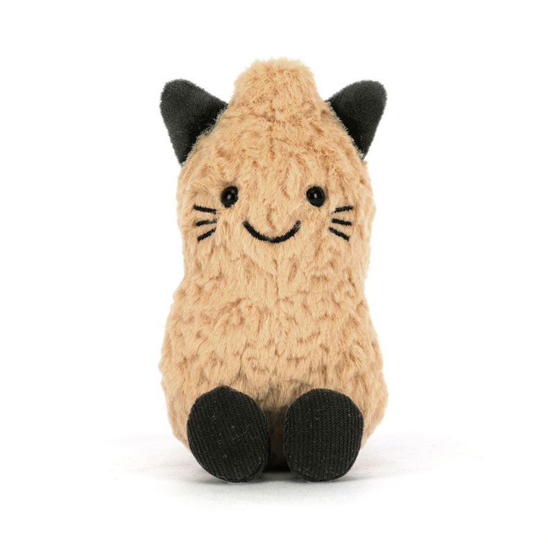 Tan fluffy cat plush toy with black ears, embroidered whiskers, black button eyes, and black corduroy feet, photographed against a light grey background.