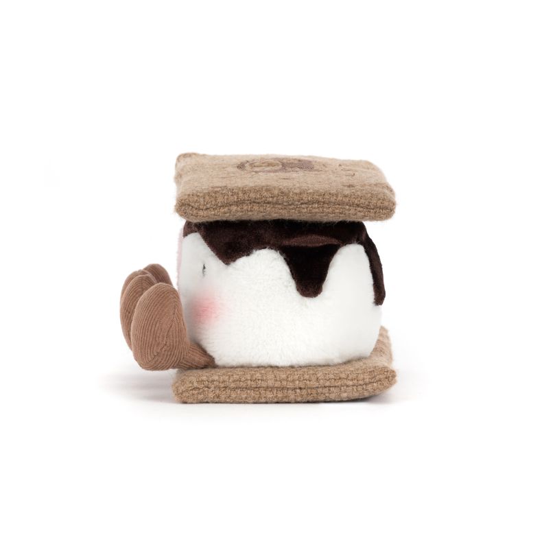 Side view of Jellycat plush toy shaped like s'mores, featuring smiling pink and white marshmallows between two biscuit layers.