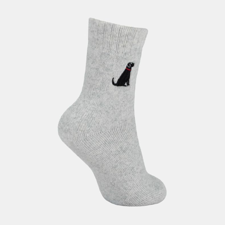 Light grey ankle sock with a soft marl texture and ribbed cuff, featuring an embroidered black dog motif with a red collar on the outer ankle, shown from an angled side view against a white background.