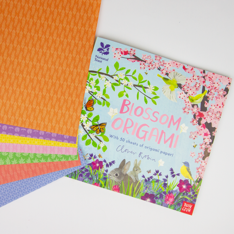 Blossom Origami book by Clover Robin shown with colourful patterned origami paper sheets