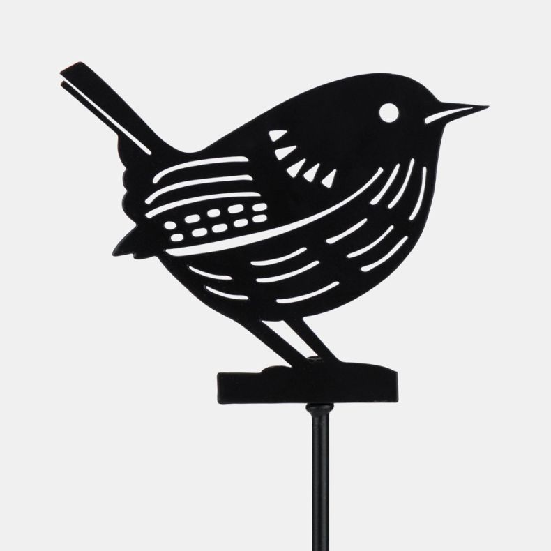Close-up of decorative black metal garden stake featuring a perched bird silhouette with cut-out feather detailing and textured plumage design on a stake mount