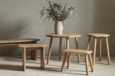 Stourhead oak furniture collection. Image shows benches and tables made from oak