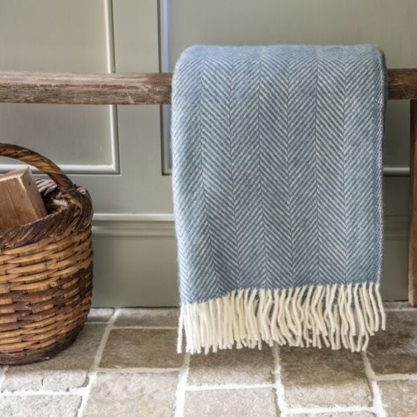 National trust throws and blanket in blue with herringbone detail